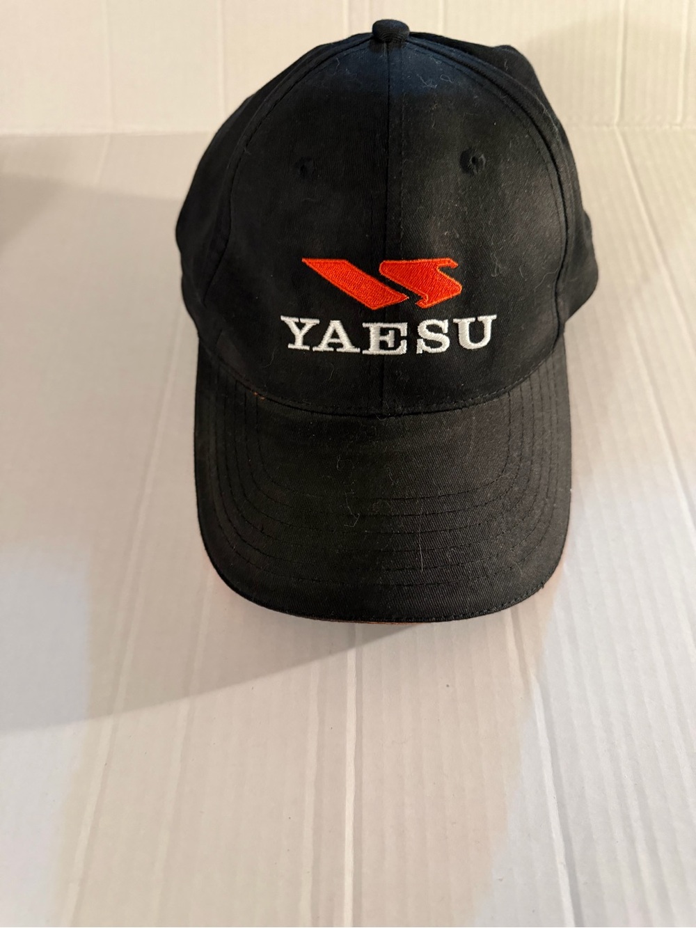 Yaesu Black Baseball Cap with Orange Logo